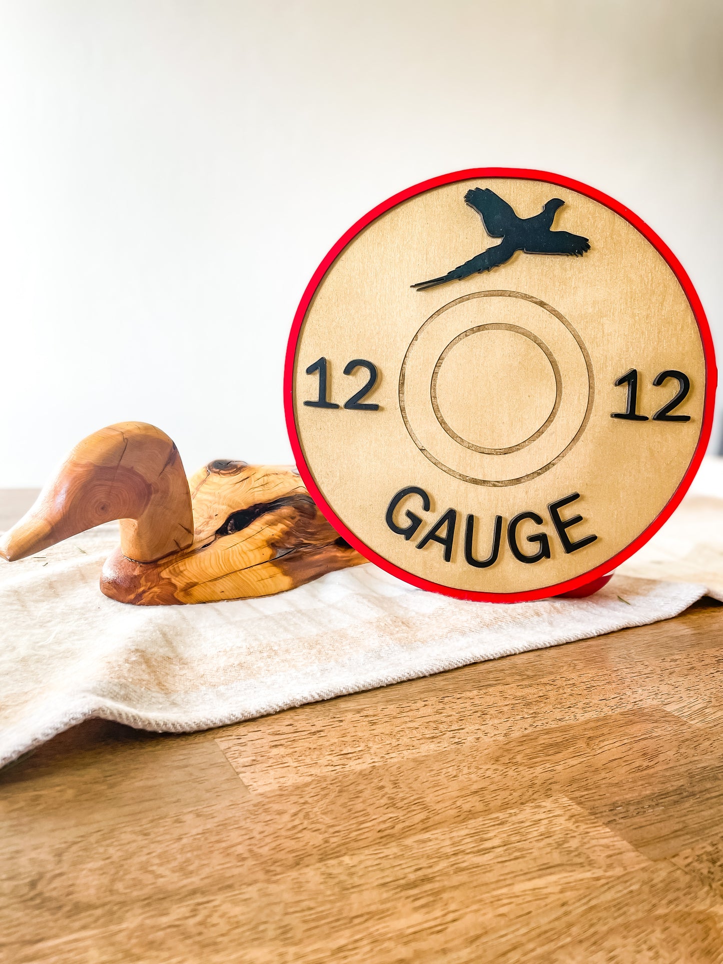 Shotgun shell round sign