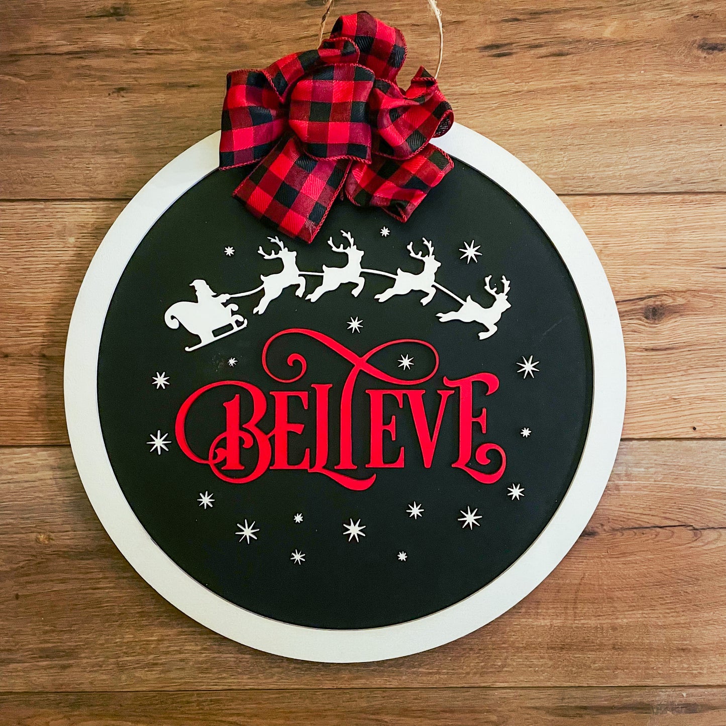 Believe round sign