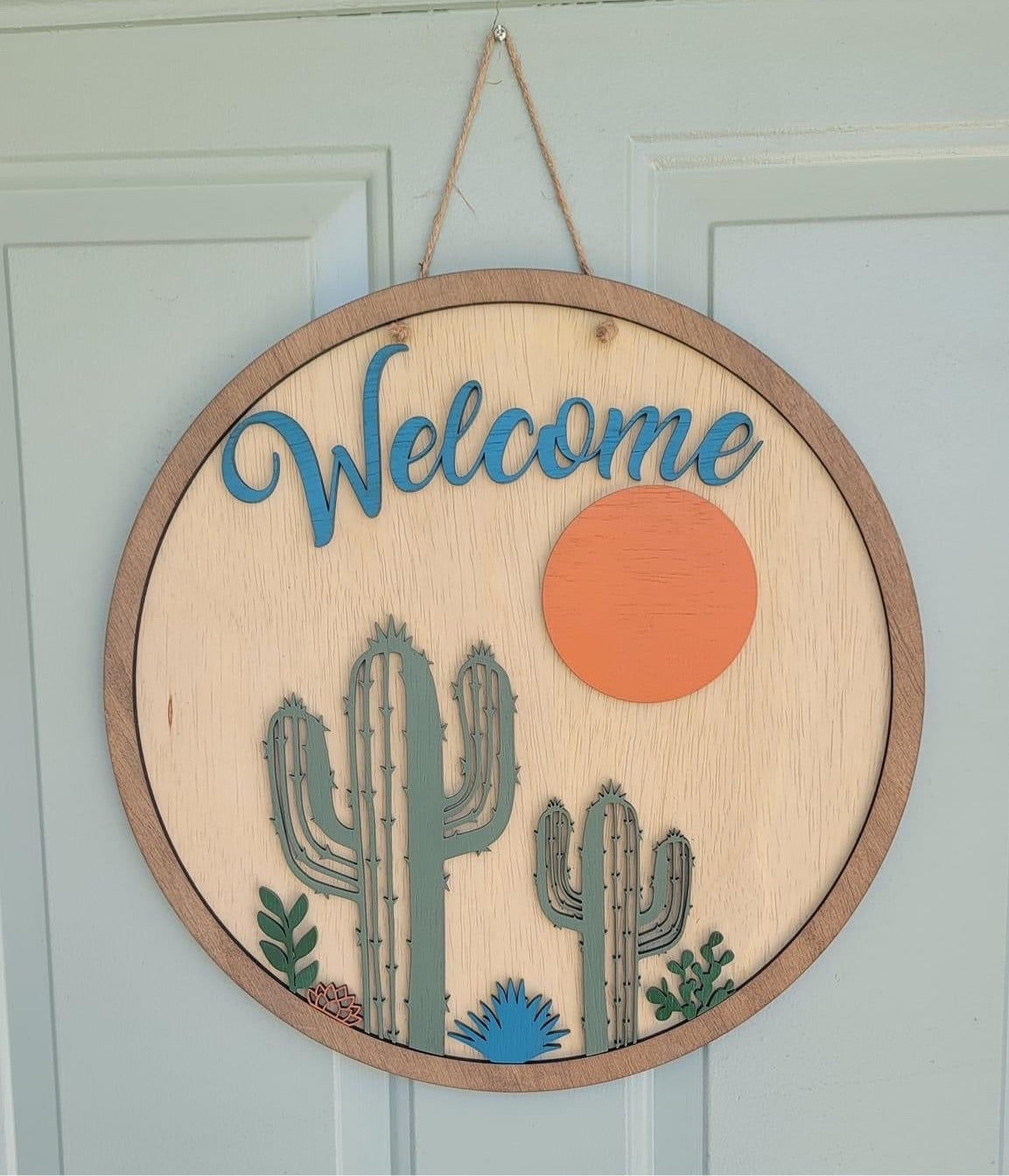 Cactus welcome round sign
