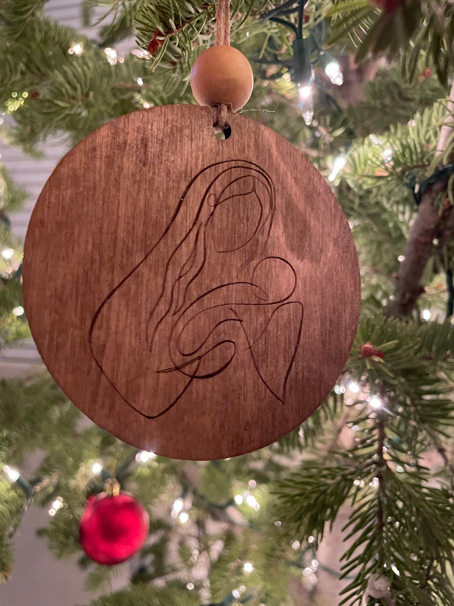 Mary holding Jesus ornament