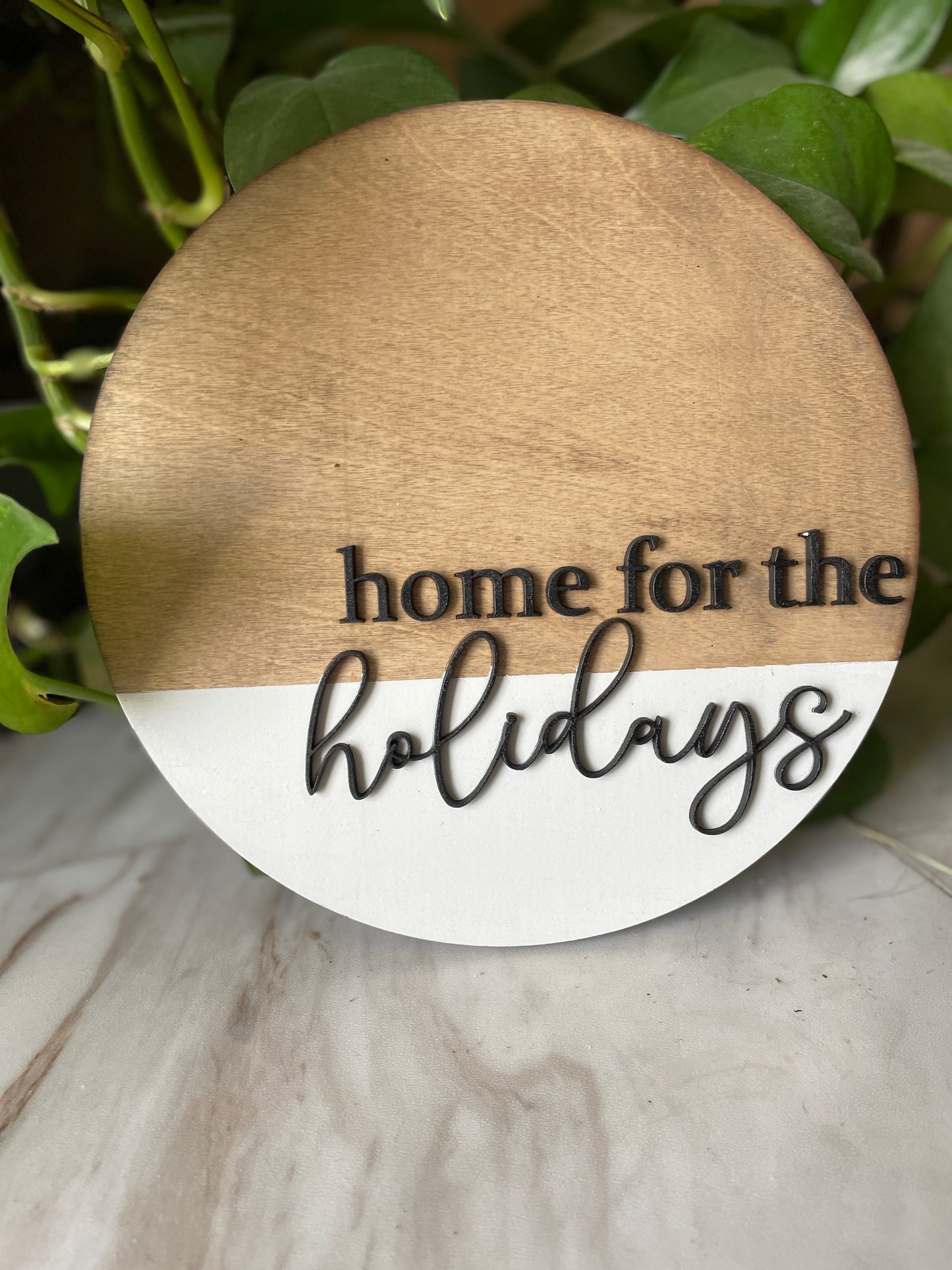 Home for the holidays round sign