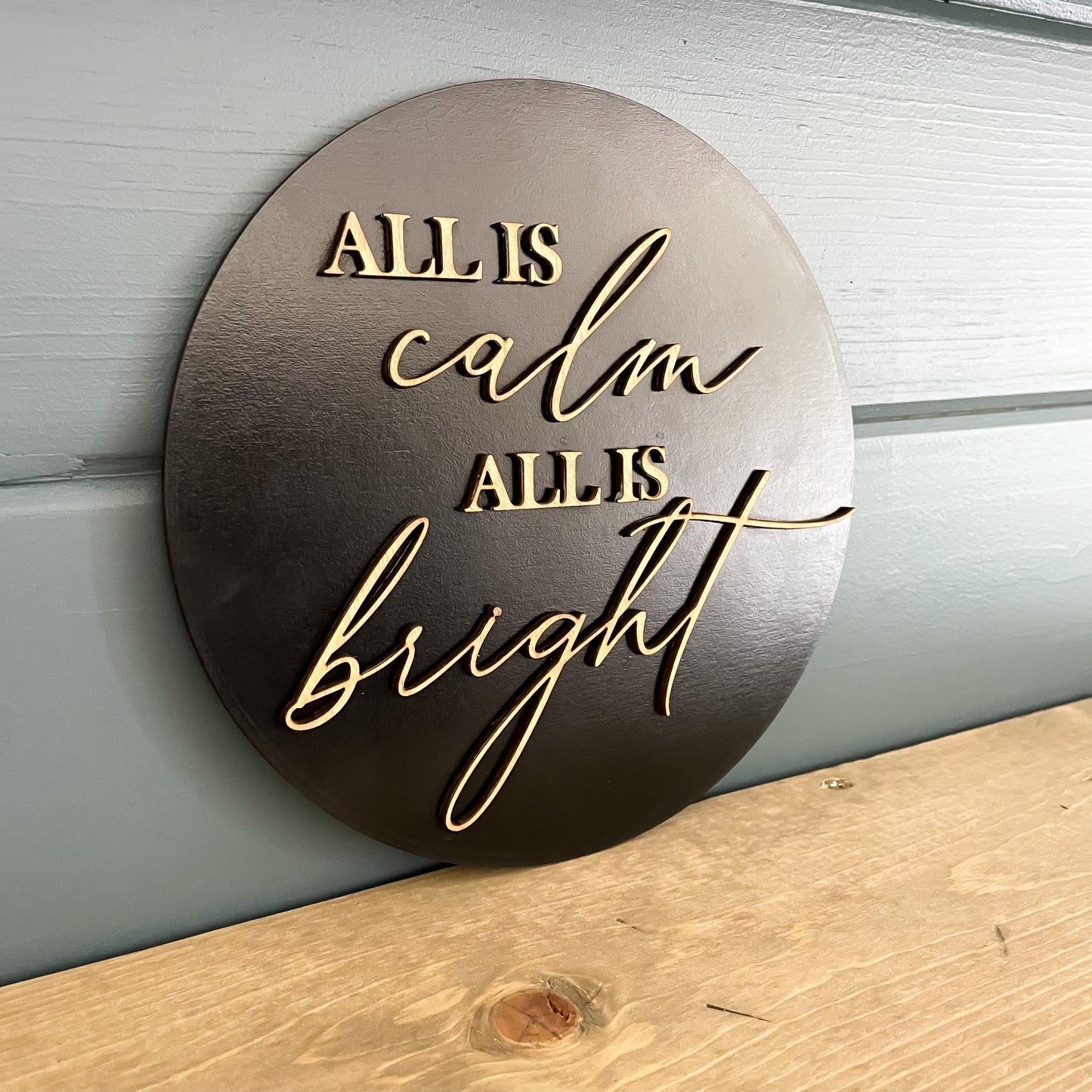 All is calm round sign