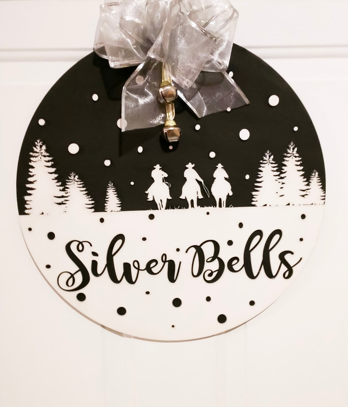 Silver bells round sign